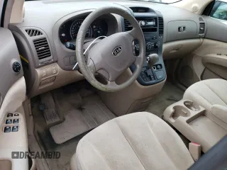 2006 Kia Sedona LX with VIN KNDMB233466022537, listed as a Copart auction lot 71130354 with 215,997 mi miles and Salvage Title. Bid and sale history available at carsss.com. Image 8.