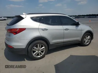 2013 Hyundai Santa Fe Sport z VIN 5XYZUDLA2DG069389, wystawiony jako Copart lot #64054684 z przebiegiem 162 861 mil mil oraz Szkoda całkowita • Salvage title. Historia ofert i sprzedaży dostępna na DreamBid. Obrazek 3.