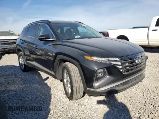 2022 Hyundai Tucson SEL with VIN 5NMJBCAE5NH030189, listed as a Copart auction lot 75327374 with 33,864 mi miles and Salvage Title. Bid and sale history available at DreamBid. Image 4.