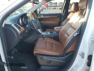 2013 Jeep Grand Cherokee Overland with VIN 1C4RJECG9DC644823, listed as a Copart auction lot 83232414 with 193,205 mi miles and Salvage Title. Bid and sale history available at carsss.com. Image 7.