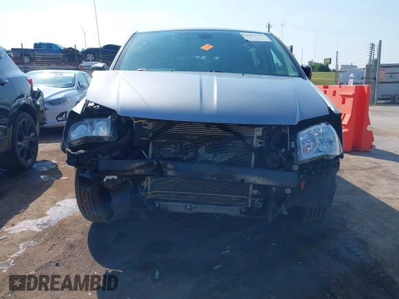 2020 Dodge Grand Caravan SE with VIN 2C4RDGBG1LR237363, listed as a IAAI auction lot 40096749 with 120,742 mi miles and . Bid and sale history available at DreamBid. Image 12.