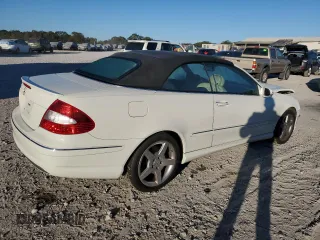 2009 Mercedes-Benz CLK-Class 3.5L with VIN WDBTK56FX9T108328, listed as a Copart auction lot 74586884 with 49,660 mi miles and Salvage Title. Bid and sale history available at carsss.com. Image 3.