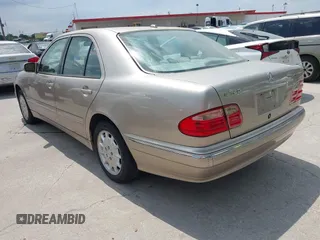 2000 Mercedes-Benz E-Class with VIN WDBJF82JXYX035704, listed as a IAAI auction lot 42045969 with 1 mi miles. Bid and sale history available at carsss.com. Image 3.
