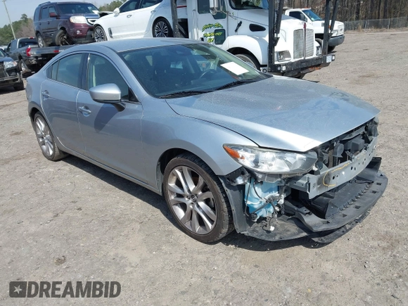 2017 Mazda Mazda6 Touring with VIN JM1GL1V52H1126639, listed as a IAAI auction lot 41802868 with 181,948 mi miles. Bid and sale history available at carsss.com. Image 1.