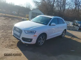 2015 Audi Q3 Premium Plus with VIN WA1EFCFS9FR012788, listed as a IAAI auction lot 41655224 with 129,080 mi miles and . Bid and sale history available at DreamBid. Image 2.