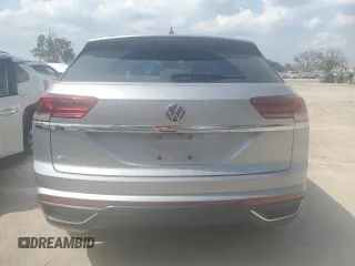 2023 Volkswagen Atlas SE z VIN 1V2WC2CA3PC219429, wystawiony jako Copart lot #54626654 z przebiegiem 12 371 mil mil oraz . Historia ofert i sprzedaży dostępna na DreamBid. Obrazek 6.