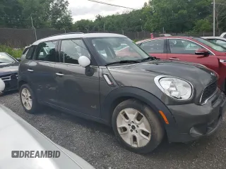 2011 MINI Countryman S z VIN WMWZC5C56BWL53827, wystawiony jako Copart lot #58953505 z przebiegiem Nie podano mil oraz Szkody całkowita. Historia ofert i sprzedaży dostępna na DreamBid. Obrazek 4.