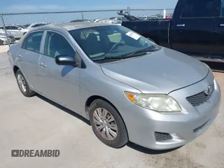 2009 Toyota Corolla with VIN 1NXBU40E79Z134599, listed as a IAAI auction lot 42035077 with 154,051 mi miles. Bid and sale history available at carsss.com. Image 1.
