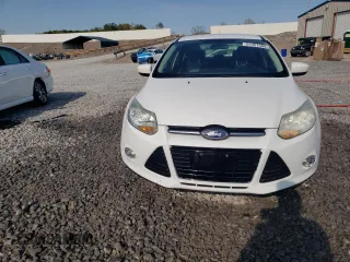 2012 Ford Focus SE with VIN 1FAHP3F27CL182474, listed as a Copart auction lot 51451595 with 122,199 mi miles and Salvage Title. Bid and sale history available at DreamBid. Image 5.