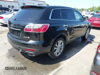 2012 Mazda CX-9 Grand Touring with VIN JM3TB2DA9C0347747, listed as a IAAI auction lot 41996548 with 130,671 mi miles and . Bid and sale history available at DreamBid. Image 4.