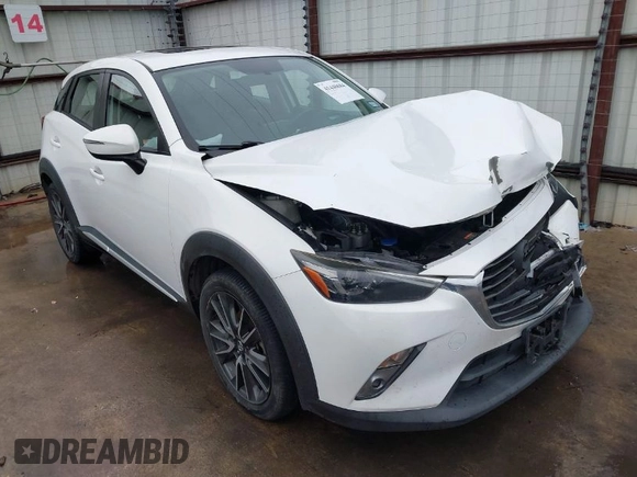 2016 Mazda CX-3 Grand Touring with VIN JM1DKBD73G0124742, listed as a IAAI auction lot 41448684 with 96,322 mi miles. Bid and sale history available at carsss.com. Image 1.