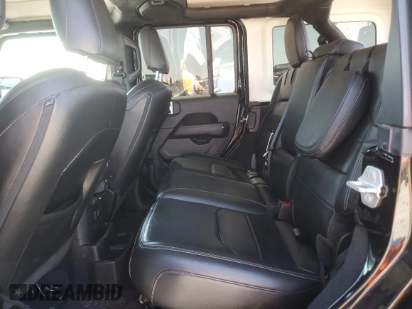 2023 Jeep Wrangler Sahara with VIN 1C4JJXP61PW512975, listed as a Copart auction lot 59392075 with 26,954 mi miles and Salvage title. Bid and sale history available at DreamBid. Image 10.