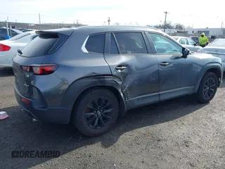 2025 Mazda CX-50 S Premium with VIN 7MMVABDM0SN316760, listed as a IAAI auction lot 41864360 with 6,555 mi miles and . Bid and sale history available at DreamBid. Image 4.
