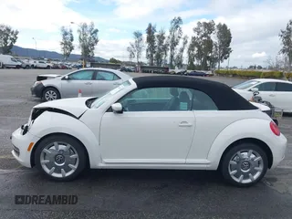 2013 Volkswagen Beetle 2.5L z VIN 3VW5P7AT9DM825439, wystawiony jako IAAI lot #41760907 z przebiegiem 53 649 mil mil oraz . Historia ofert i sprzedaży dostępna na DreamBid. Obrazek 14.