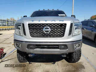 2017 Nissan Titan XD SV with VIN 1N6BA1F4XHN521471, listed as a Copart auction lot 76291024 with 100,447 mi miles and Salvage Title. Bid and sale history available at carsss.com. Image 5.