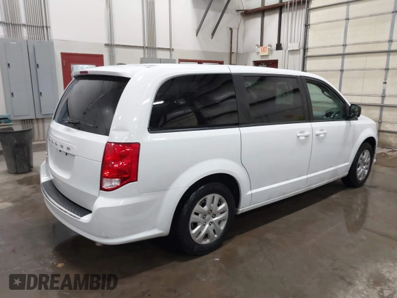 2018 Dodge Grand Caravan SE with VIN 2C4RDGBG5JR190786, listed as a IAAI auction lot 41603163 with 102,351 mi miles and . Bid and sale history available at DreamBid. Image 4.