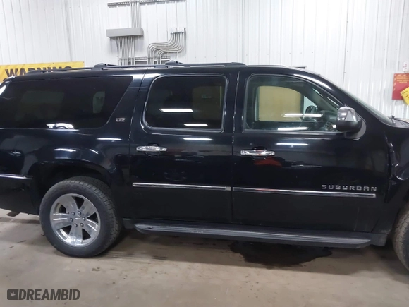 2012 Chevrolet Suburban LTZ with VIN 1GNSKKE77CR326924, listed as a IAAI auction lot 41764487 with 198,224 mi miles. Bid and sale history available at carsss.com. Image 14.