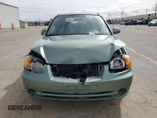 2003 Hyundai Accent GL with VIN KMHCG35C13U270585, listed as a Copart auction lot 50197935 with 53,822 mi miles and Salvage Title. Bid and sale history available at carsss.com. Image 5.