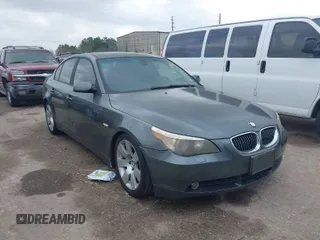 2007 BMW 5 Series 530i with VIN WBANE73557CM49980, listed as a IAAI auction lot 41518849 with 106,231 mi miles. Bid and sale history available at carsss.com. Image 1.