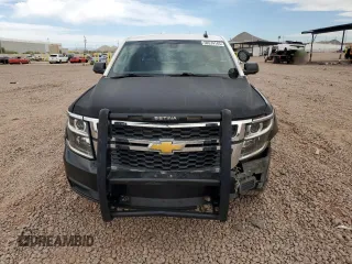 2017 Chevrolet Tahoe Commercial with VIN 1GNLCDEC4HR219881, listed as a Copart auction lot 50574145 with 115,700 mi miles and Salvage title. Bid and sale history available at DreamBid. Image 5.