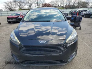 2018 Ford Focus SE with VIN 1FADP3FEXJL215912, listed as a Copart auction lot 50518385 with 100,080 mi miles and Salvage Title. Bid and sale history available at carsss.com. Image 5.