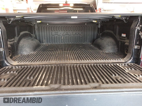2022 Ram 1500 Big Horn with VIN 1C6RRFFG2NN179020, listed as a IAAI auction lot 42573638 with 61,517 mi miles and . Bid and sale history available at DreamBid. Image 21.