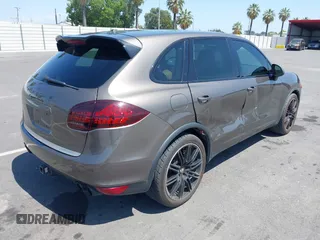 2012 Porsche Cayenne Turbo with VIN WP1AC2A21CLA82667, listed as a IAAI auction lot 42383728 with 133,134 mi miles and . Bid and sale history available at DreamBid. Image 4.