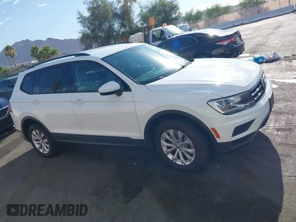 2020 Volkswagen Tiguan S with VIN 3VV1B7AXXLM036994, listed as a IAAI auction lot 42643035 with 62,676 mi miles and . Bid and sale history available at DreamBid. Image 13.