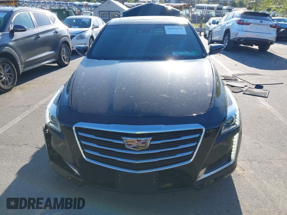 2015 Cadillac CTS Premium AWD with VIN 1G6AZ5S35F0129572, listed as a IAAI auction lot 42045670 with 62,758 mi miles and . Bid and sale history available at DreamBid. Image 12.