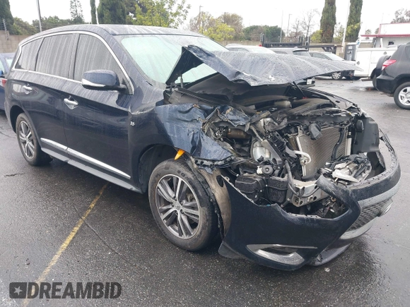 2019 Infiniti QX60 LUXE with VIN 5N1DL0MN1KC512944, listed as a IAAI auction lot 41515162 with 60,090 mi miles. Bid and sale history available at carsss.com. Image 1.