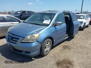 2005 Honda Odyssey EX-L with VIN 5FNRL387X5B083902, listed as a IAAI auction lot 42005085 with 249,861 mi miles. Bid and sale history available at carsss.com. Image 2.