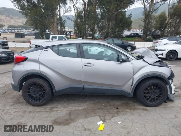 2018 Toyota C-HR XLE with VIN NMTKHMBX4JR023586, listed as a IAAI auction lot 41890863 with 86,958 mi miles and . Bid and sale history available at DreamBid. Image 13.