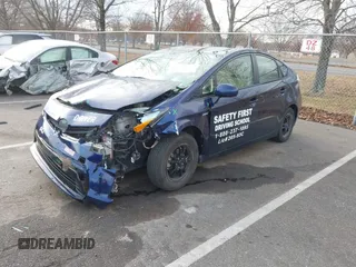 2015 Toyota Prius Four with VIN JTDKN3DU6F0404759, listed as a IAAI auction lot 41017473 with 79,005 mi miles. Bid and sale history available at carsss.com. Image 2.