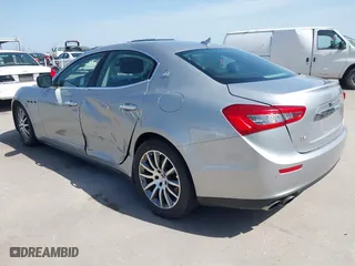 2014 Maserati Ghibli S Q4 with VIN ZAM57RTA8E1085631, listed as a IAAI auction lot 41829745 with 80,418 mi miles. Bid and sale history available at carsss.com. Image 3.