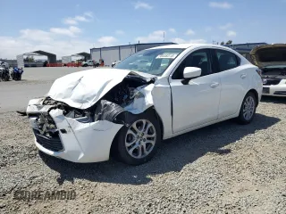 2016 Scion iA z VIN 3MYDLBZV6GY141773, wystawiony jako Copart lot #58448315 z przebiegiem Nie podano mil oraz Szkody całkowita. Historia ofert i sprzedaży dostępna na DreamBid. Obrazek 1.
