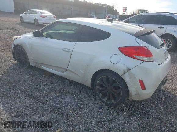 2013 Hyundai Veloster w/Gray Int with VIN KMHTC6AD4DU140121, listed as a IAAI auction lot 41410252 with 202,596 mi miles and . Bid and sale history available at DreamBid. Image 3.