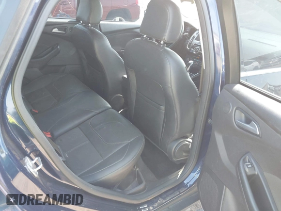 2017 Ford Focus Titanium with VIN 1FADP3J29HL204892, listed as a IAAI auction lot 42032705 with 119,028 mi miles and . Bid and sale history available at DreamBid. Image 8.