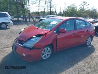 2007 Toyota Prius z VIN JTDKB20U577558459, wystawiony jako IAAI lot #42265933 z przebiegiem 104 286 mil mil oraz . Historia ofert i sprzedaży dostępna na DreamBid. Obrazek 2.