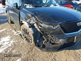 2024 Cadillac XT6 AWD Sport z VIN 1GYKPHRS4RZ700307, wystawiony jako IAAI lot #41257556 z przebiegiem 18 292 mil mil oraz . Historia ofert i sprzedaży dostępna na DreamBid. Obrazek 6.