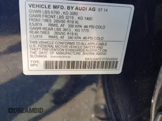 2015 Audi Q7 Premium Plus with VIN WA1LGAFE1FD004894, listed as a Copart auction lot 60435305 with 106,553 mi miles and Salvage title. Bid and sale history available at DreamBid. Image 13.