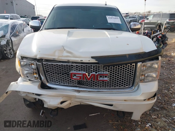 2011 GMC Sierra 1500 Denali z VIN 3GTP2XE20BG152905, wystawiony jako IAAI lot #41079419 z przebiegiem 158 192 mil mil oraz . Historia ofert i sprzedaży dostępna na DreamBid. Obrazek 13.