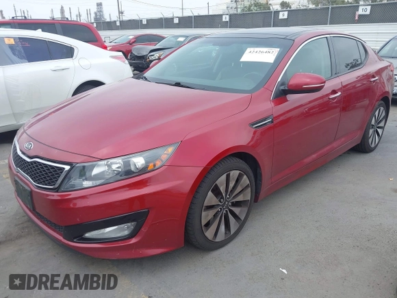 2012 Kia Optima SX z VIN 5XXGR4A64CG019121, wystawiony jako IAAI lot #42426482 z przebiegiem 137 496 mil mil oraz . Historia ofert i sprzedaży dostępna na DreamBid. Obrazek 2.