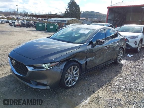 2023 Mazda 3 S Premium with VIN 3MZBPBDM8PM373434, listed as a IAAI auction lot 41234729 with 9,387 mi miles and . Bid and sale history available at DreamBid. Image 17.