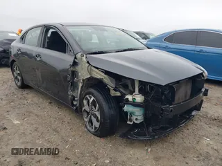 2019 Kia Forte LXS z VIN 3KPF24AD0KE097627, wystawiony jako IAAI lot #41909007 z przebiegiem 155 378 mil mil oraz . Historia ofert i sprzedaży dostępna na DreamBid. Obrazek 1.