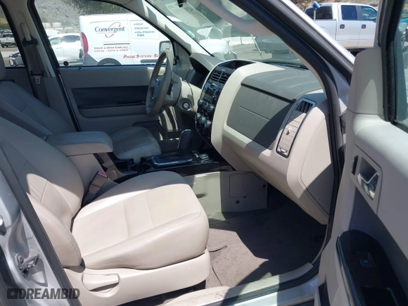2009 Ford Escape Hybrid with VIN 1FMCU49309KC11542, listed as a IAAI auction lot 42028593 with 168,573 mi miles. Bid and sale history available at carsss.com. Image 5.