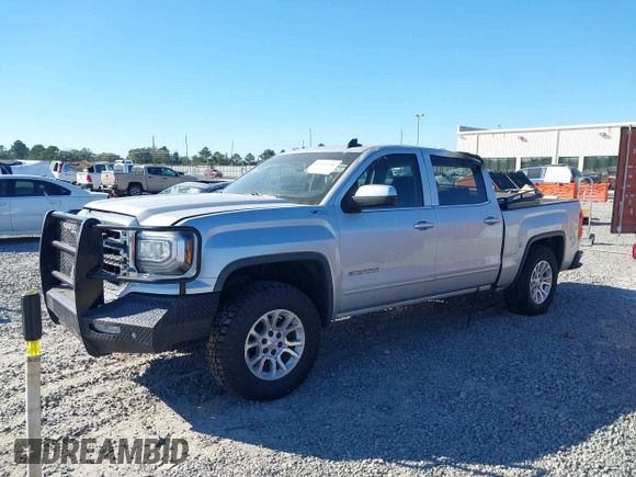 2017 GMC Sierra 1500 SLE with VIN 3GTU2MEC3HG199980, listed as a IAAI auction lot 40534708 with 129,765 mi miles and . Bid and sale history available at DreamBid. Image 17.