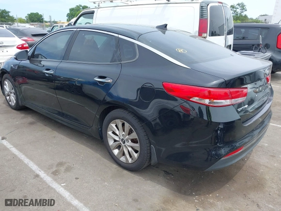 2016 Kia Optima EX with VIN 5XXGU4L38GG075652, listed as a IAAI auction lot 39544592 with 151,960 mi miles. Bid and sale history available at carsss.com. Image 3.