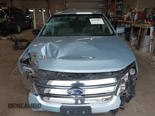 2010 Ford Fusion Hybrid z VIN 3FADP0L34AR276532, wystawiony jako IAAI lot #41491883 z przebiegiem 159 076 mil mil oraz . Historia ofert i sprzedaży dostępna na DreamBid. Obrazek 12.