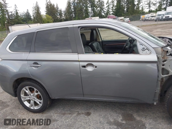 2014 Mitsubishi Outlander GT with VIN JA4JZ4AX9EZ017406, listed as a IAAI auction lot 42291696 with 107,680 mi miles and . Bid and sale history available at DreamBid. Image 14.