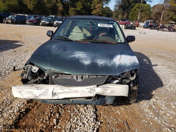 2000 Mazda Protege DX with VIN JM1BJ2224Y0250062, listed as a Copart auction lot 43661005 with 0 mi miles and Salvage Title. Bid and sale history available at carsss.com. Image 5.
